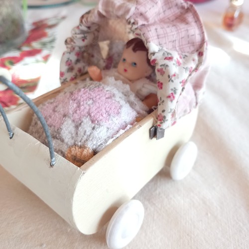 Puppenwagen für die